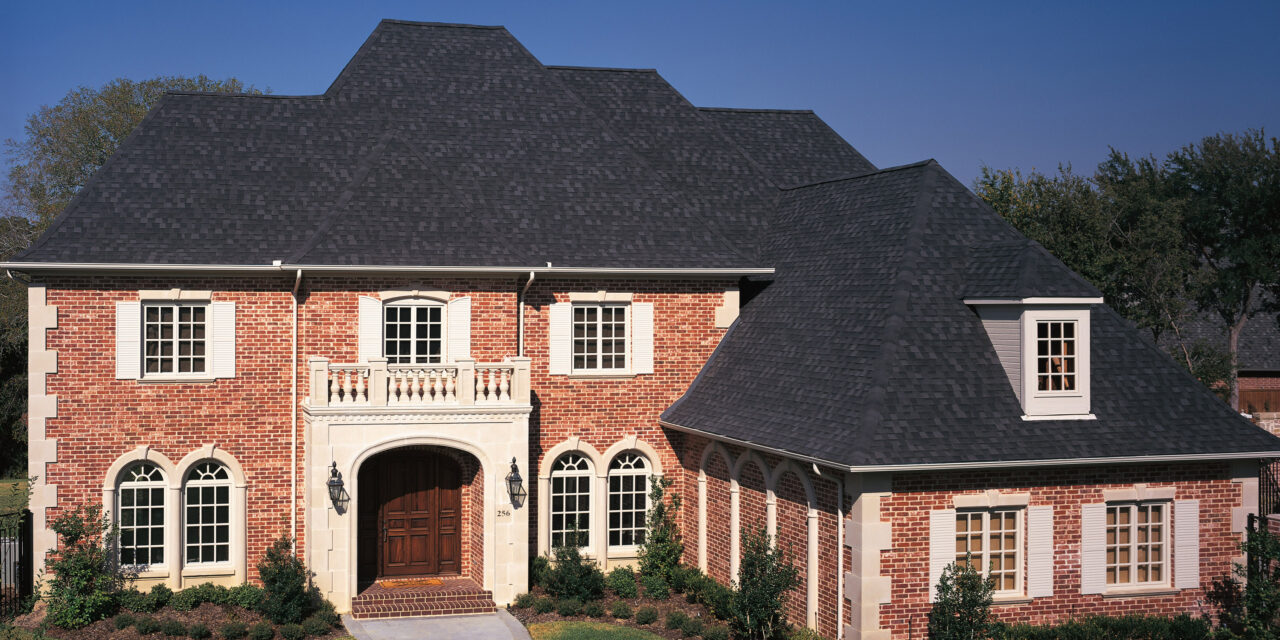Contemporary residential siding and dark roofline